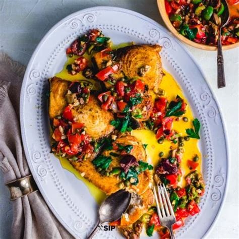 Pan Seared Swordfish Steaks With Olives And Capers.